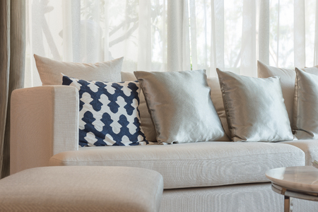 set of pillows and sofa in classic living room syle with black lampの写真素材