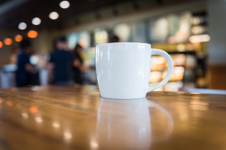 coffee cup in coffee shop - vintage style effect pictureの写真素材