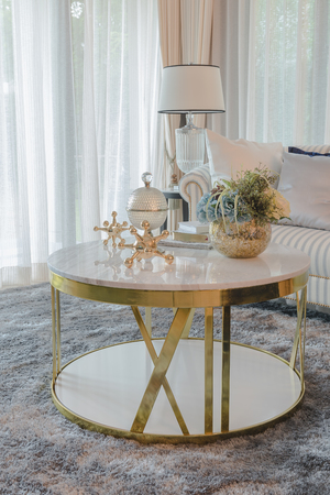 set of sofa with pillows and classic white lamp in luxury living room, interior designの写真素材