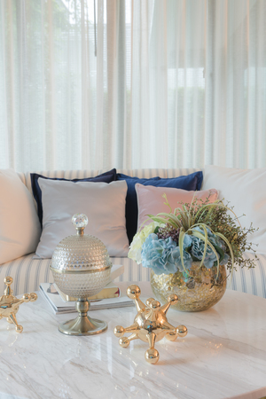 set of sofa with pillows and classic white lamp in luxury living room, interior designの写真素材