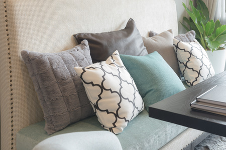 set of pillows on luxuty sofa in living room, interior designの写真素材