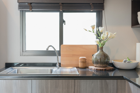 modern kitchen room with black granite on top of counter, interior designの写真素材