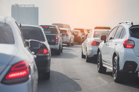 traffic jam on toll way with row of cars, rush hour, vintage style processの写真素材