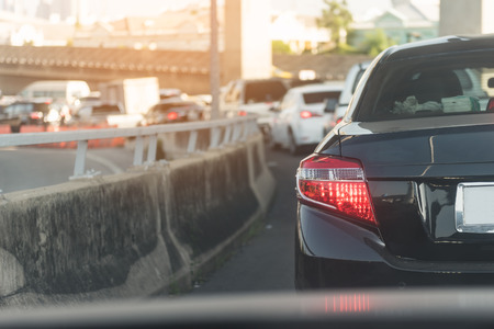 traffic jam with row of cars on toll way, during rush hourの写真素材