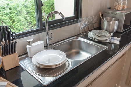 Sink in kitchen room, modern counter with sink in kitchen room, interior design conceptの写真素材