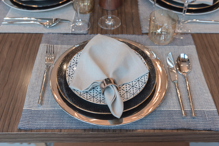 luxury table set style on wooden dining table, interior decoration design concept