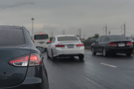 traffic jam with row of cars during the rainの写真素材