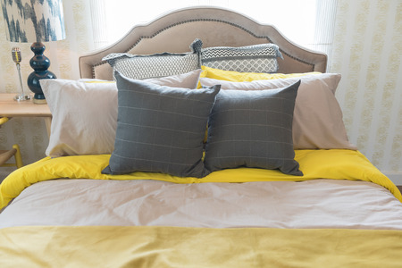 classic bedroom style with set of pillows on bed, interior design conceptの写真素材