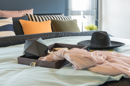 luxury bedroom with set of colorful pillows on bed, interior decoration design conceptの写真素材