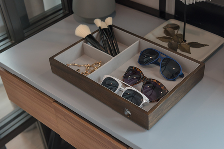 women accessories in box set on table at homeの写真素材