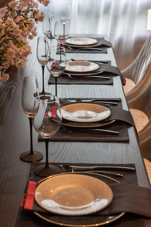 classic style dining room with table set on wooden dining room, interior design decoration concept