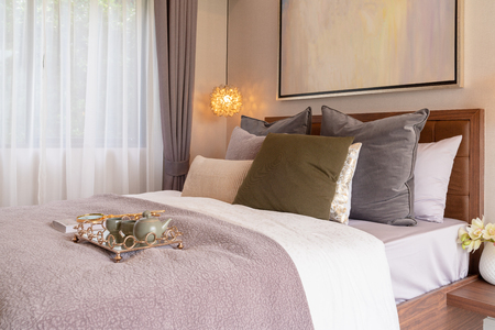 luxury bedroom design with cozy set of pillows, interior design decoration conceptの写真素材