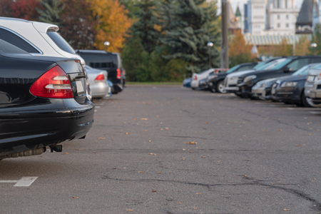 row of cars in outdoor parking lotの写真素材