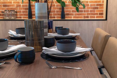 modern dining room with table set for dining, interior design concept