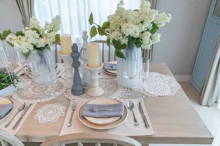 modern dining room with wooden table and chair, interior design concept decorationの写真素材