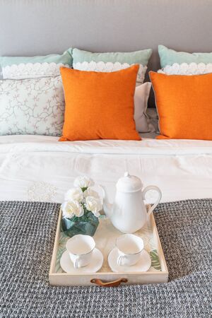 classic bedroom style with set of tea cup on wooden plate, interior design concept decorationの写真素材