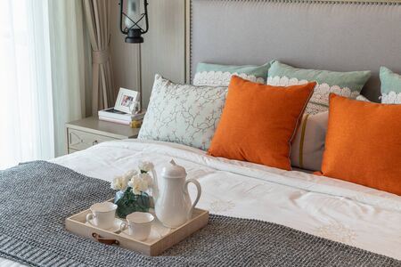 classic bedroom style with set of tea cup on wooden plate, interior design concept decorationの写真素材