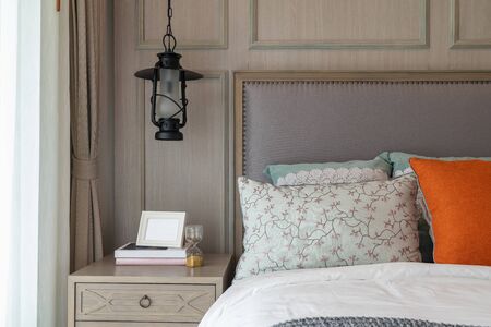 classic bedroom style with set of tea cup on wooden plate, interior design concept decorationの写真素材