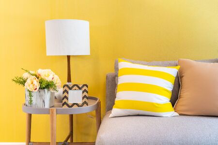 modern living room style with yellow wall, interior design concept decorationの写真素材