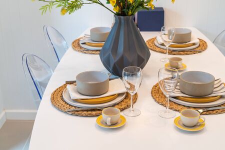 modern dining room with table set for dining, interior design conceptの写真素材