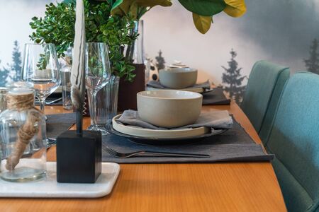 modern dining room with table set for dining, interior design conceptの写真素材