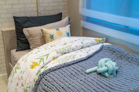 modern bedroom with set of pillows on bed, interior design concept decorationの写真素材