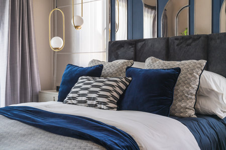 classic bedroom style with set of pillows on bed, interior design concept decoration