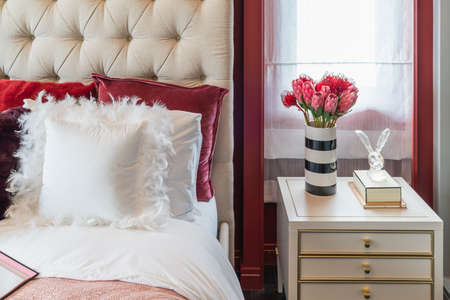 modern bedroom style with set of pillows on bed, interior design concept decoration