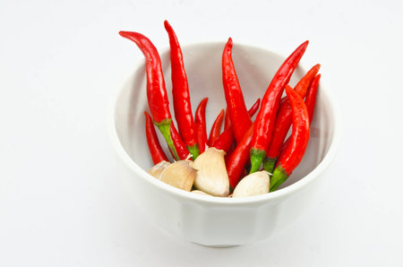 Red chili on white small cubの写真素材