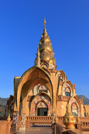 Pha Sorn Kaew temple on the mountains with sunshine and blue skyの写真素材