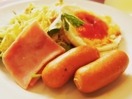 Sausage and bacon in the breakfast の写真素材