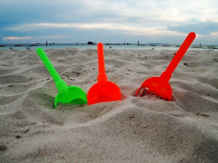 Equipment toys Placed on the sand の写真素材