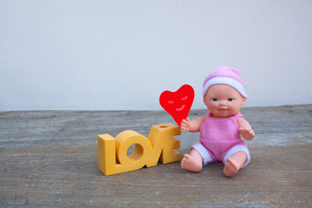 media love Valentine background happy smiles, hearts and dolls.Notes :Children's toy dolls - The public. Rightful possession.の写真素材