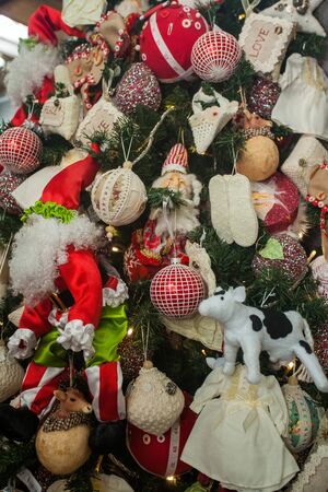 Christmas tree with bright baubles and decorationsの写真素材