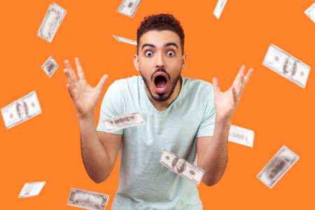 Oh my god, wow! Portrait of amazed man looking at camera with big eyes and open mouth, absolutely...