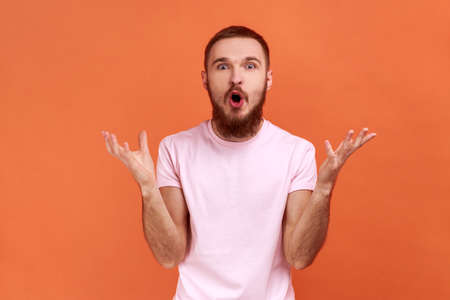 Portrait of man asking what do you want and spreading hands, seriously looking at camera, family...