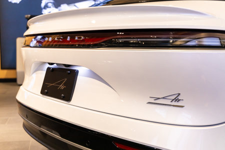 Plano Legacy West, Texas, USA - June 26, 2023: Back of white Lucid Air luxury sedan electric vehicle.のeditorial素材