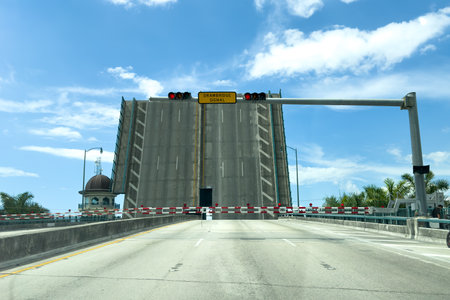 Miami, Florida - August 25th, 2023: Open bridge and drawbridge signal in district in Miami, Florida,...