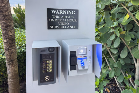 Miami, Florida - August 25th, 2023: The fingerprint access control terminal with face recognition function.のeditorial素材