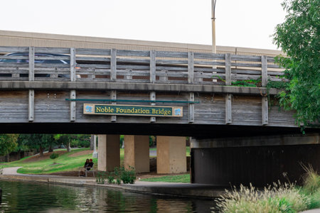 Oklahoma City, USA - October 25th, 2023: Noble Foundation Bridge in Bricktown across canal.のeditorial素材