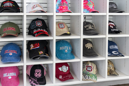 Arcadia, Oklahoma - October 25th, 2023: Souvenir shop caps collection at POPS 66 Gas station.のeditorial素材