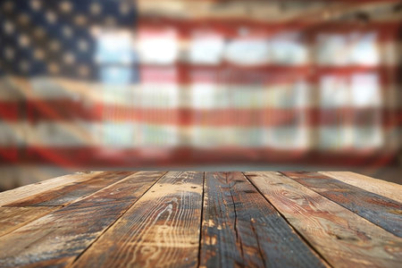 Empty wooden table over blur american flag background, product display montageの素材