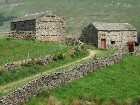 Two barns near Muker in the Yorkshire Dalesの写真素材