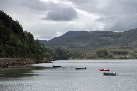 Rowing boats on Loch Torridon, Wester Ross, NW Scotland, UKの写真素材