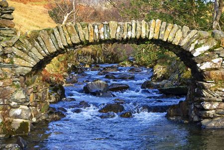 High Sweden bridge in near Ambleside in the English Lake District. A fine example of an old packhorse bridgeの写真素材