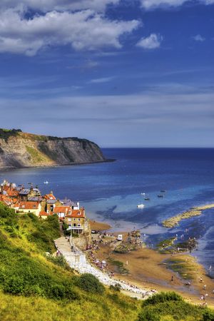 A scenic overlook of Robin Hood's Bay, a fishing village on the coast of England.の写真素材