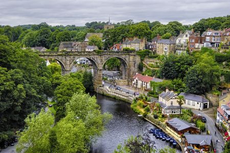 Aerial view of Knaresborough town with stone viaduct over river Nidd, North Yorkshire, Englandの写真素材