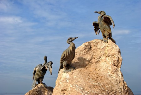 Cormorant bird sculpture on the promenade at Morecambe Bay, a coastal resort in Lancashire, England.の写真素材