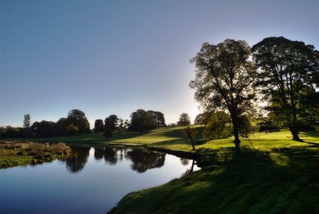 A morning view of the River Bela at Dallam Park, Cumbria, Englandの写真素材
