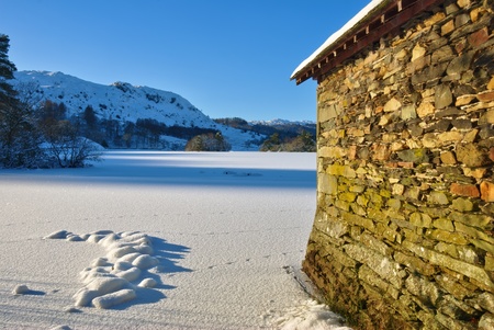 A Boathouse on frozen Rydal Waterの写真素材